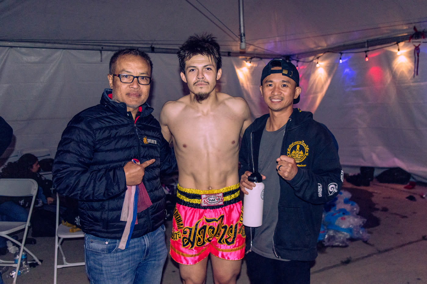 Coaches and their fighter before a bout