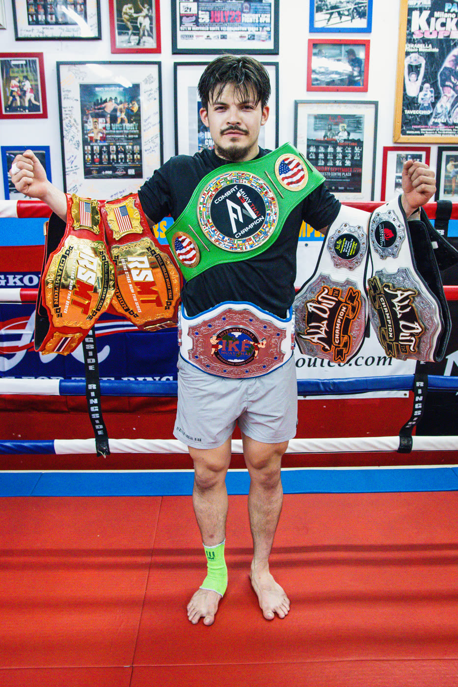 A Chaiyo champion with his belts